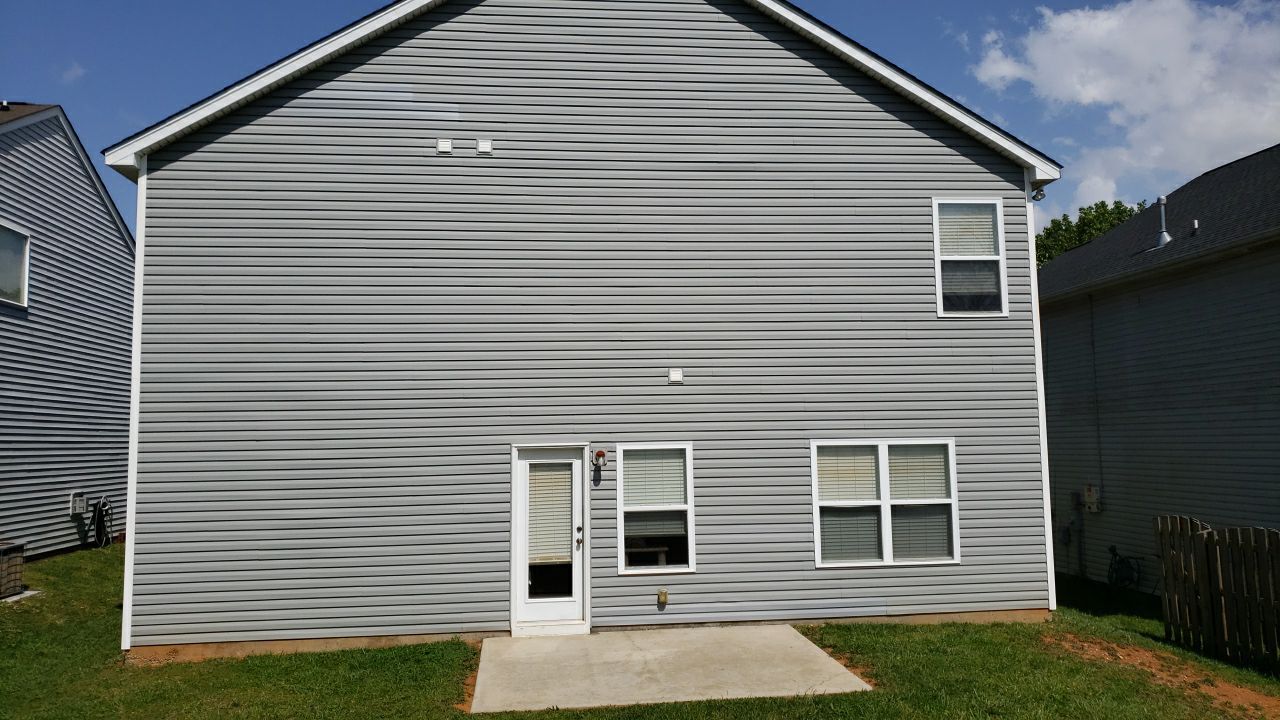 House Wash using cleaner by Power Wash Masters LLC