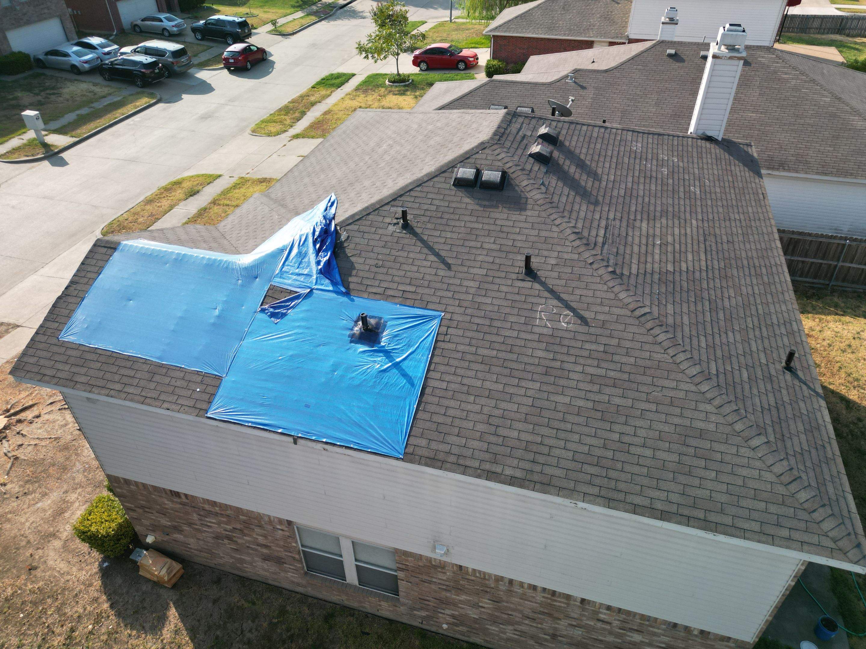 Full Roof Replacement, Chimney Rebuild and Interior Damage Replacement by First United Roofing & Construction