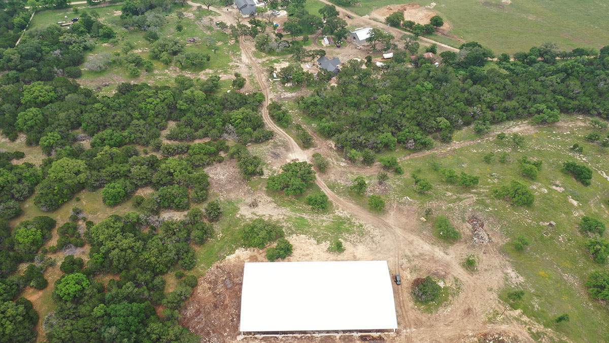 150K Equestrian center with 25K backup tank for potable water. by Hill Country Rain Water