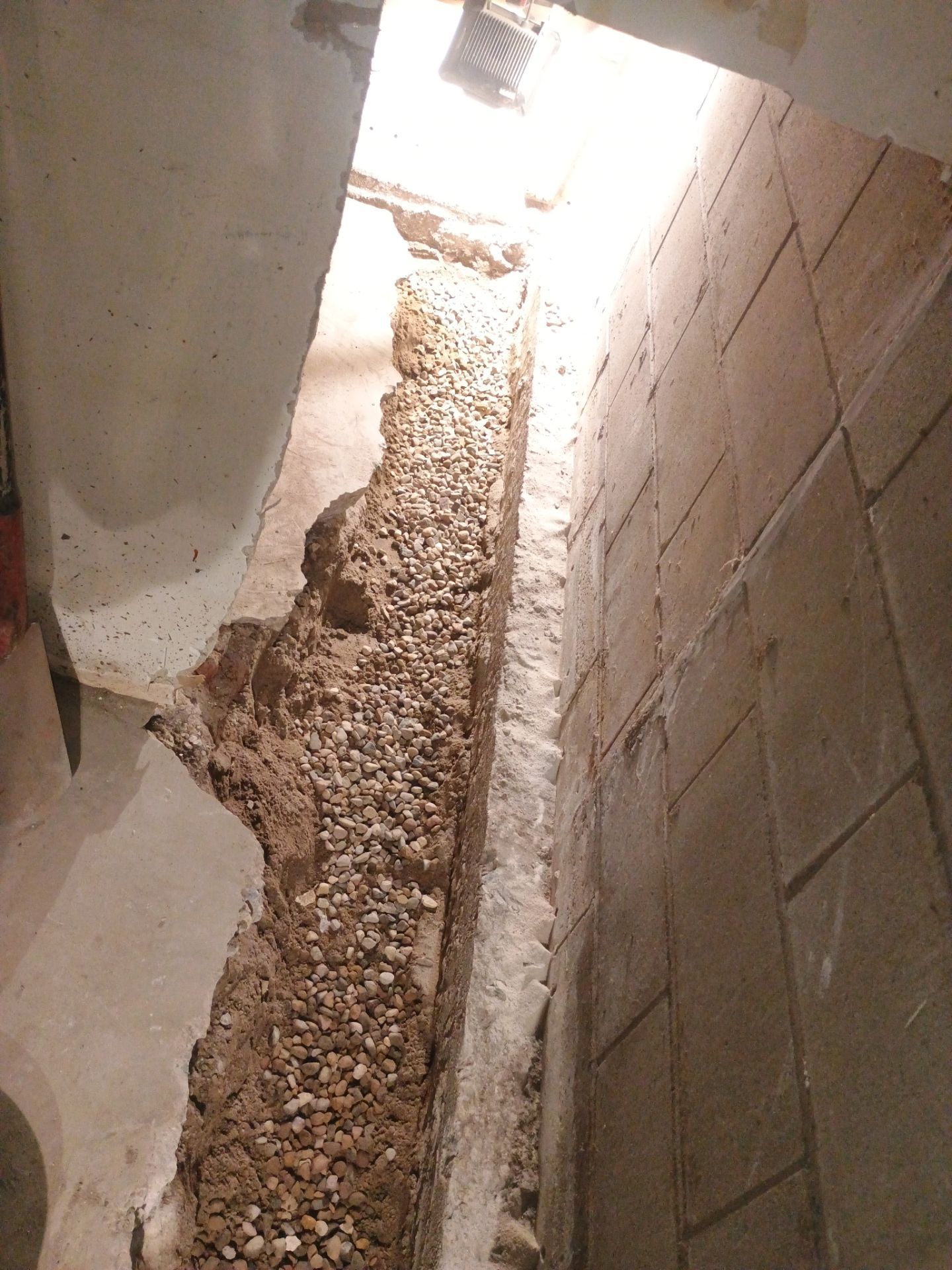 Interior Drain Tile & Buried Discharge in South Minneapolis by Waterproofing Northeast