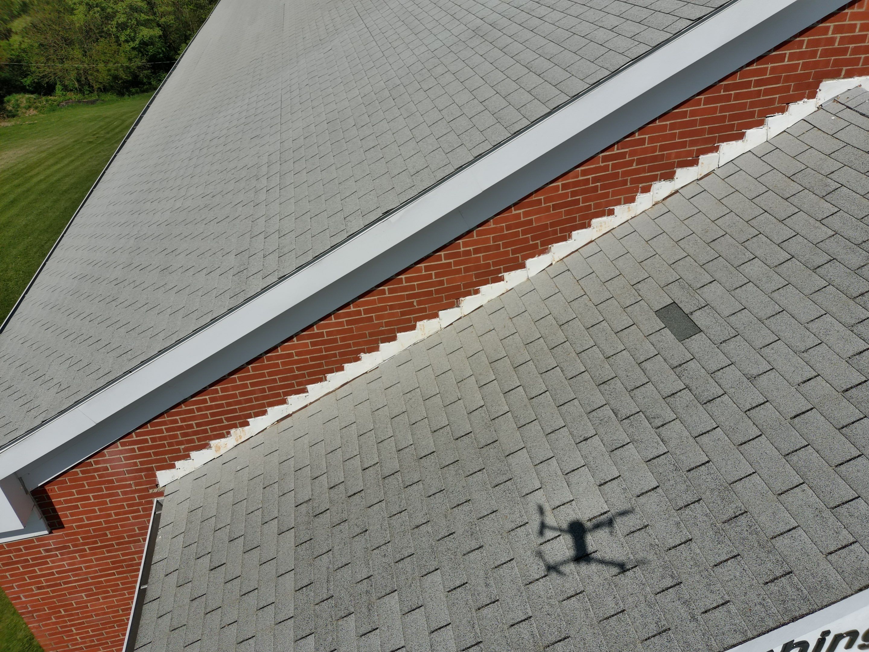 Commercial Roofing Installation using Performance Shingles by Mr. Roofer