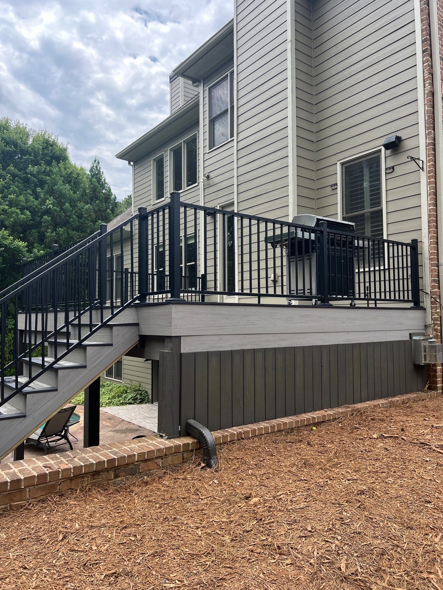 Marietta, GA Deck Resurface using Deckorators Summit Series Decking and ALX Contemporary Railing by Nelson Exteriors
