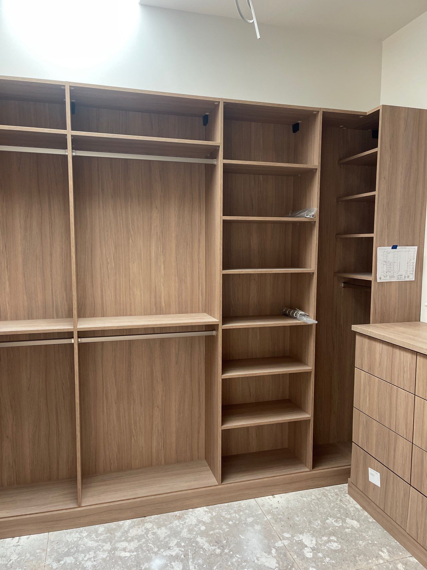 Expansive Primary Closet in Cherry Hills Village by Concept 32, Inc.