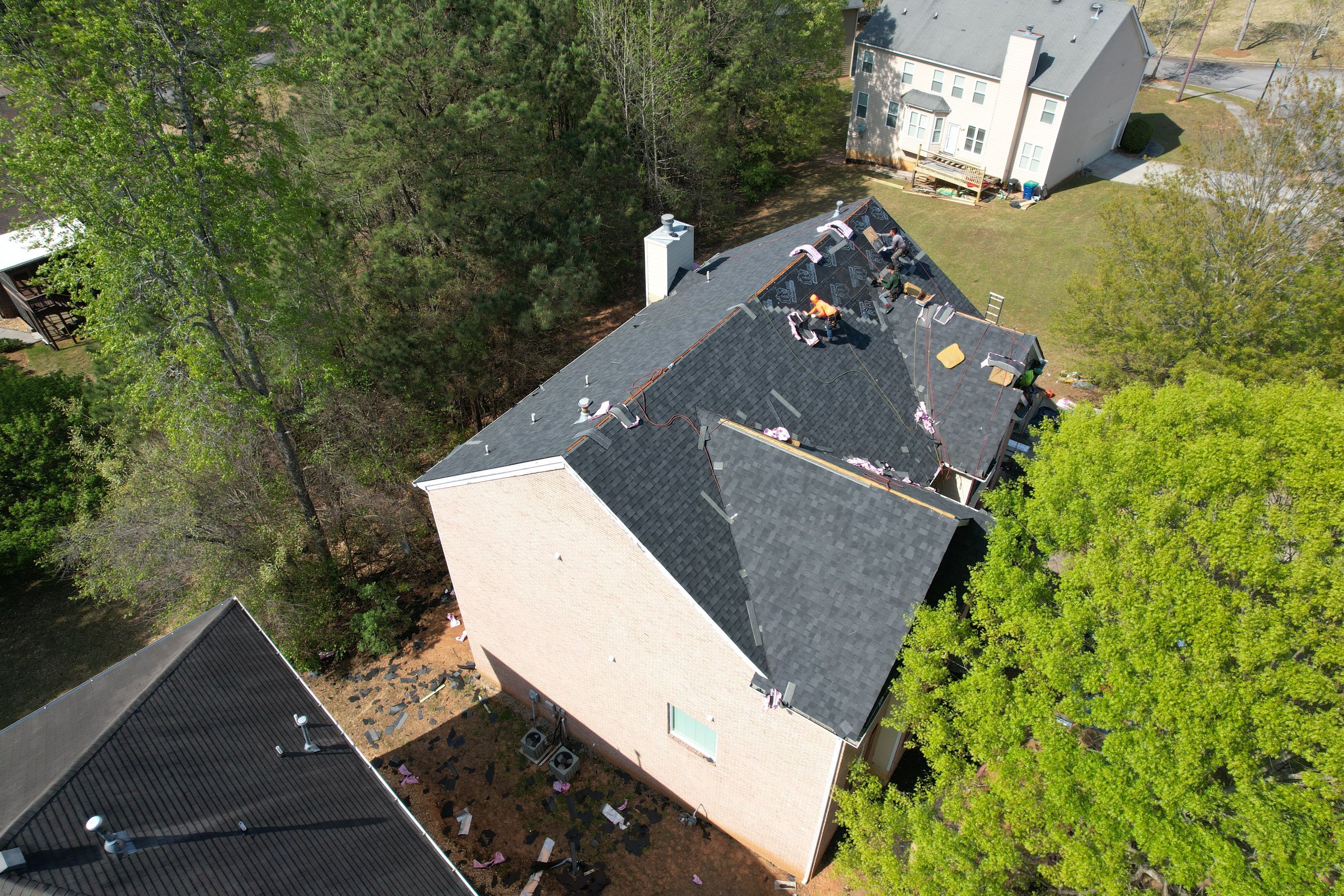 Residential Roofing Installation using Owens Corning Onyx Black by Inspector Roofing and Restoration