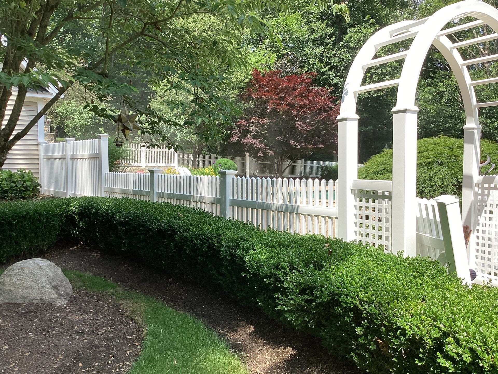Replacement White Vinyl picket fence and matching gates by DiGiorgi Roofing and Siding Inc