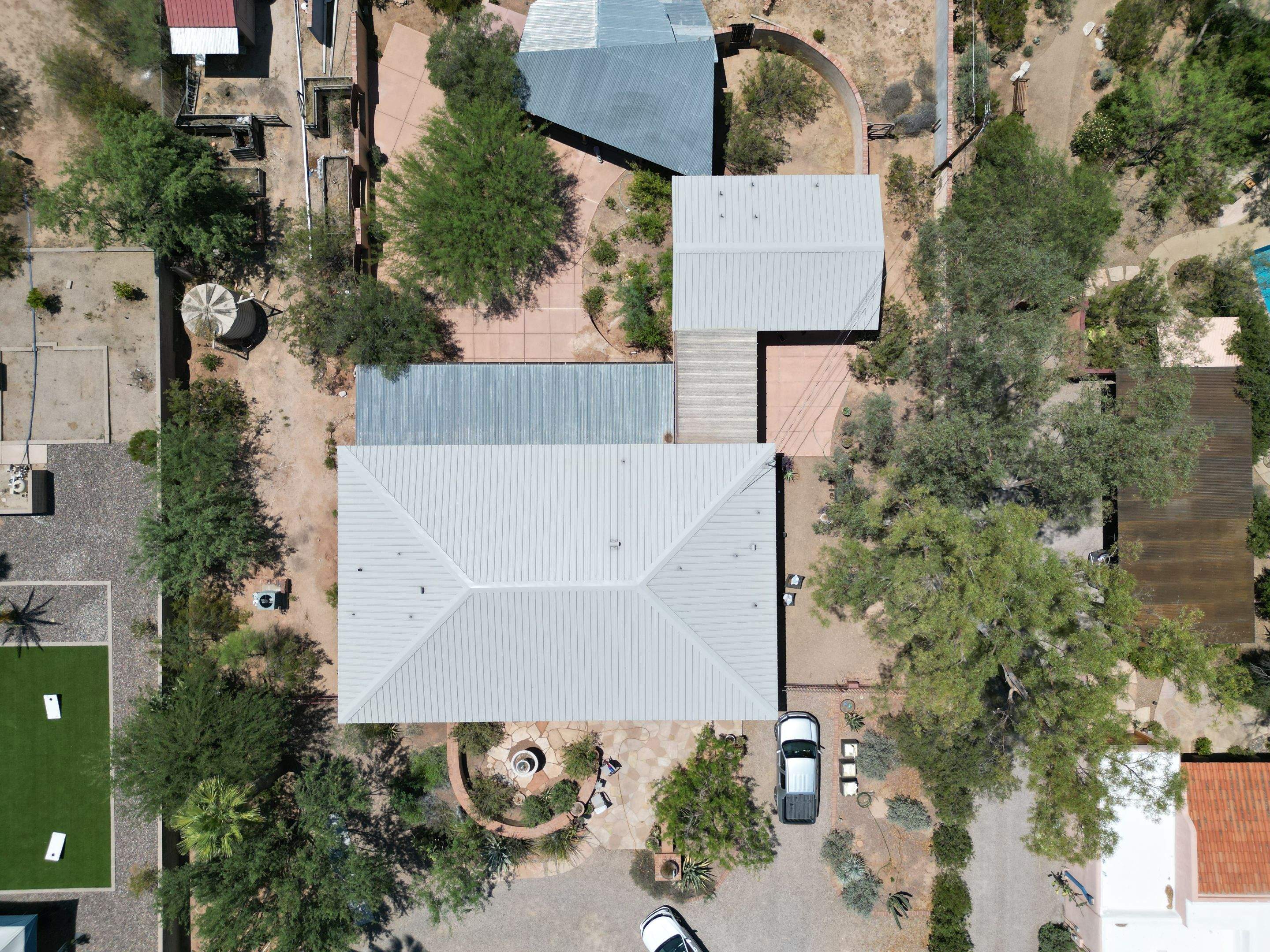 Light Stone Exposed Fastener by Reimagine Roofing
