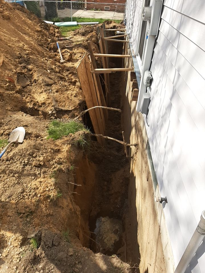 Wall Straightening and Reinforcement using Embedded Fiber Reinforcement by Toledo Basement Repair 