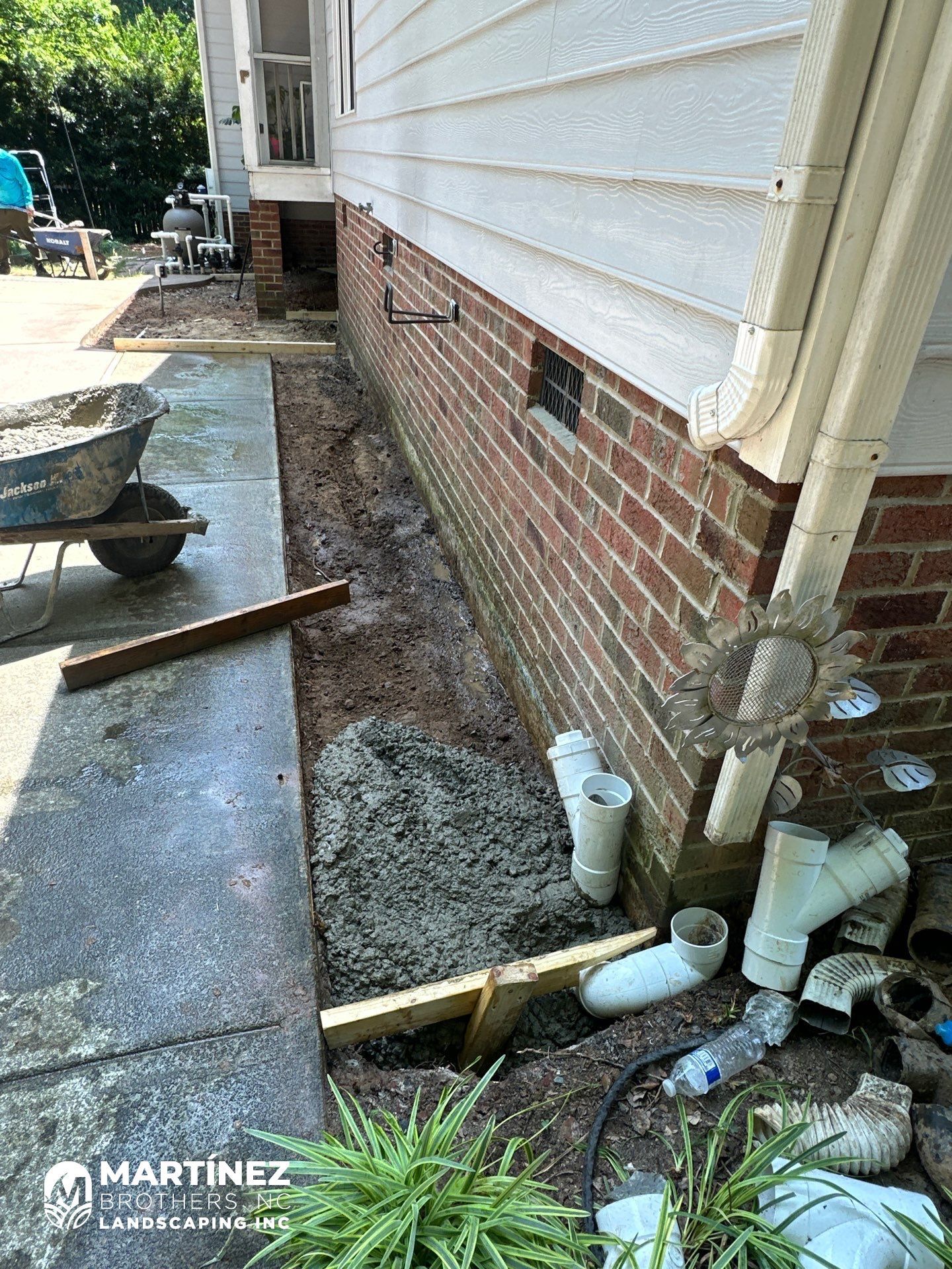 Cool decking pool in Youngsville by Martinez Brother’s Nc Landscaping Inc