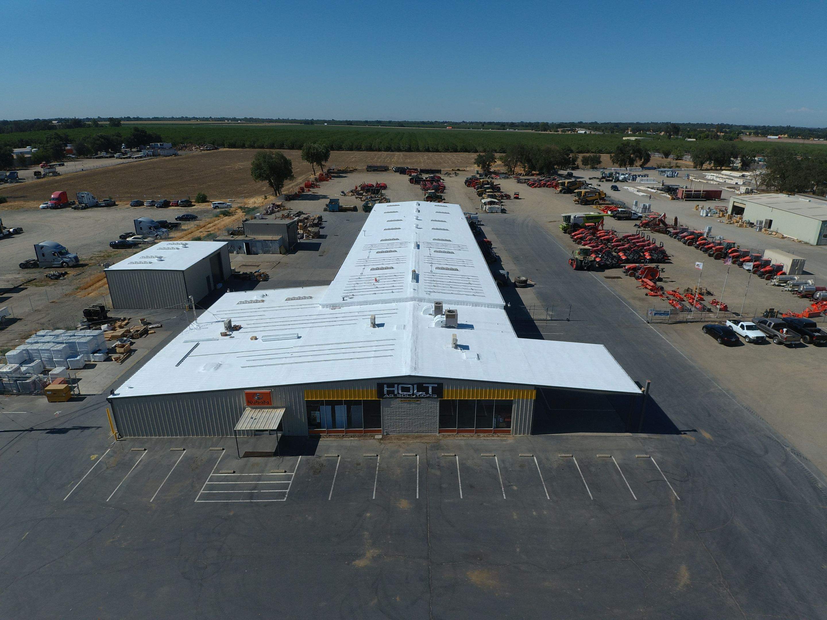 Spray foam and coatings using Conklin Benchmark/PUMA XL coatings and spray foam by Straight Edge Roofing Inc