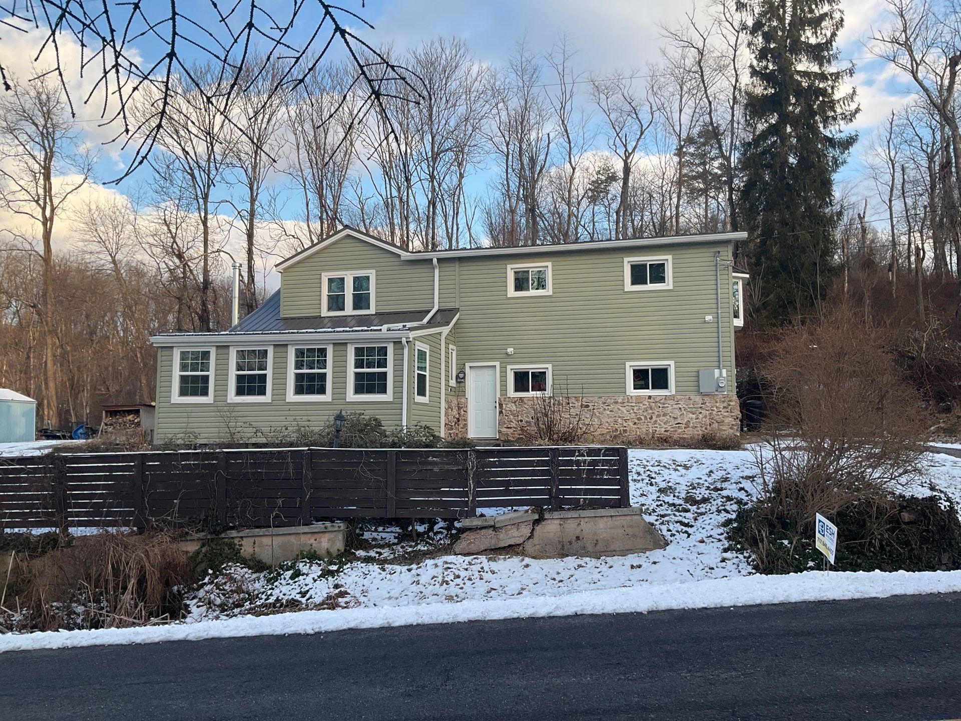 Whole-Home Exterior Transformation and Addition in Halifax by Esh Builders