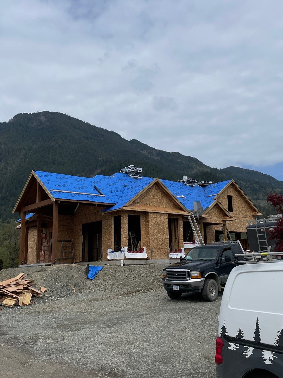 Residential Roofing Installation upgraded venting and hip and ridge capping by Top Notch Roofing Inc