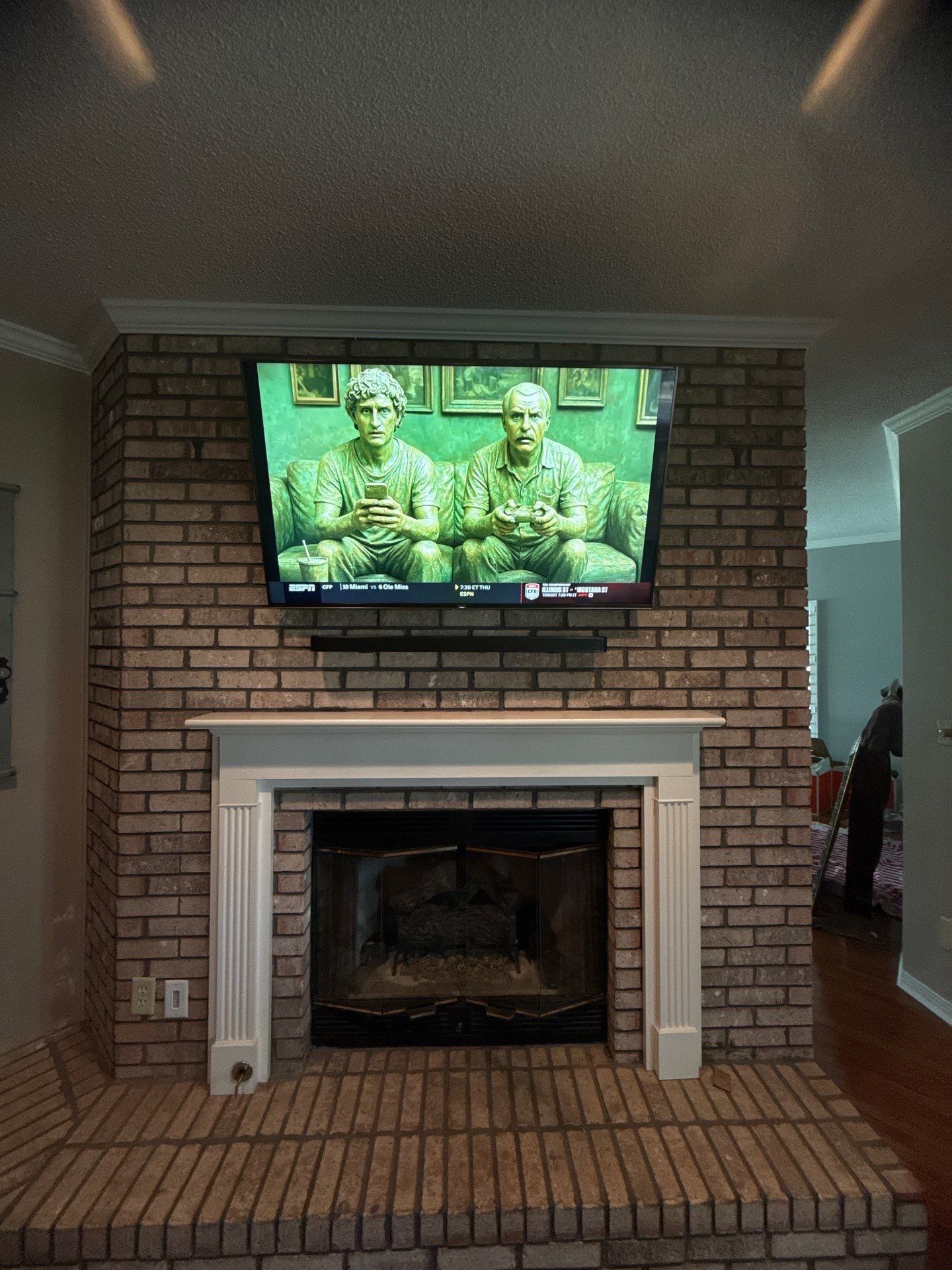 Fireplace TV Mounting Projects by Hangman Mounting & Installation 