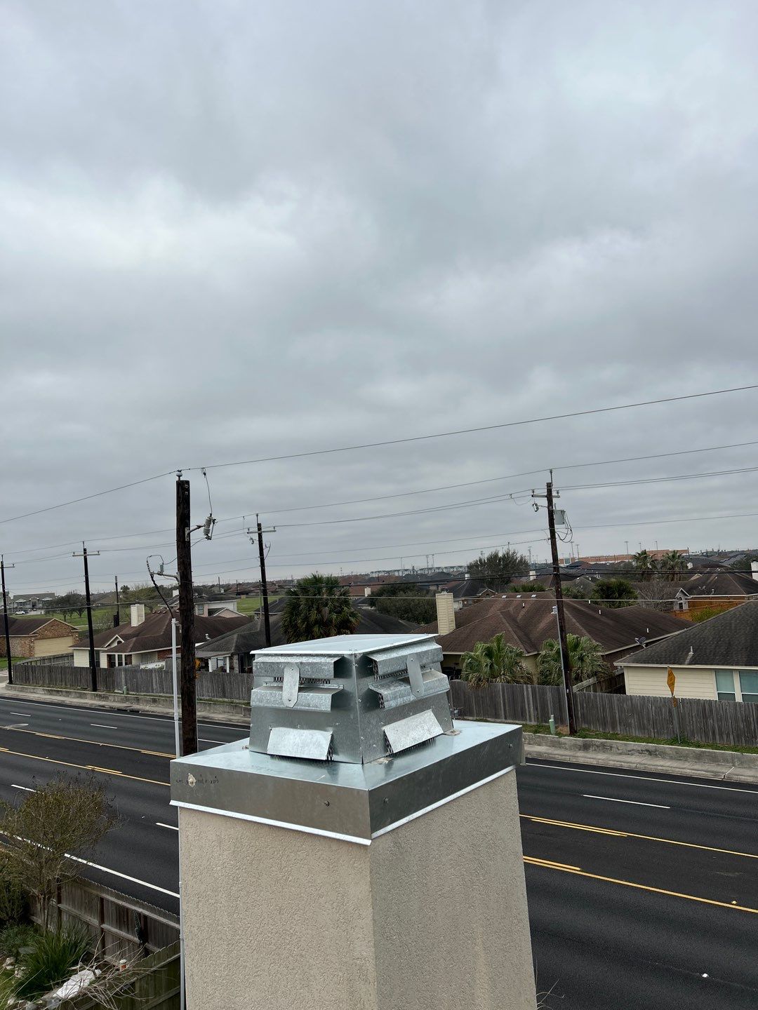 Residential Roofing Repair using Galvanized Chimney Cap & Chase by Lighthouse Roofing
