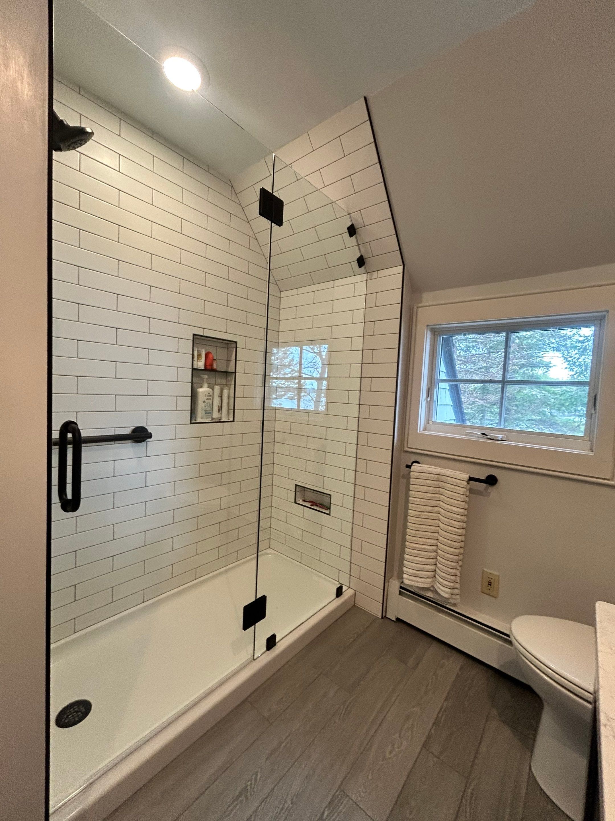 Bathroom Remodel using Tempered Shower Glass by Cheshire Glass Company