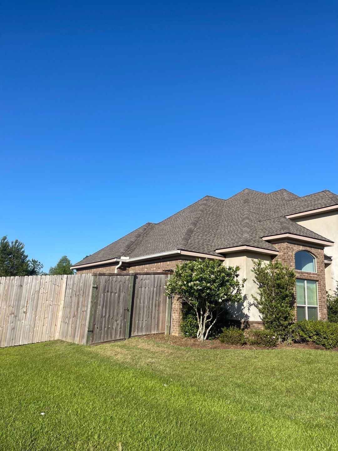 Residential Roofing Installation using Roof Replacement by American Roofing & Construction LLC
