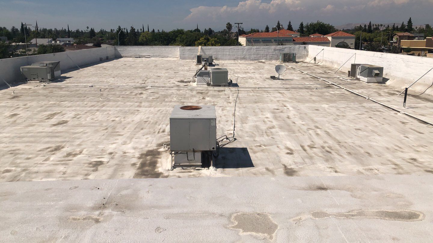 Reburbish existing spray foam job by Straight Edge Roofing Inc