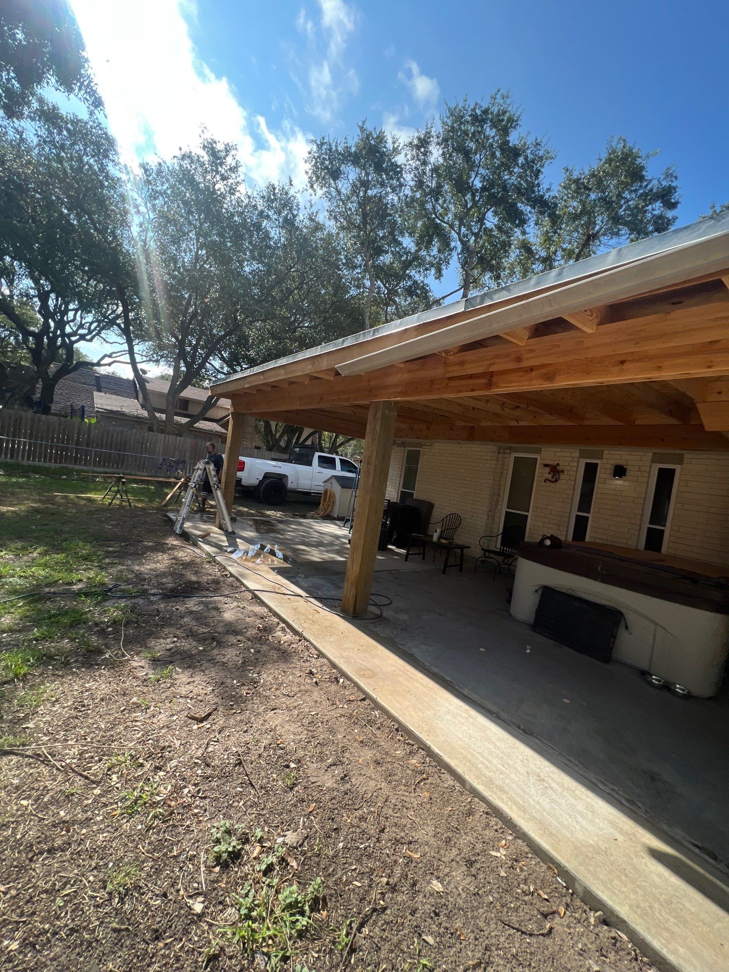 Hot Tub Time Machine  by Bayfront Roofing and Construction