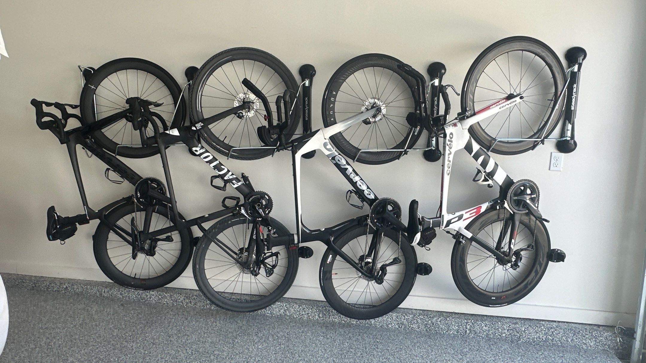 New bike storage for Jason E. along with some overhead racks  by Banner Garage