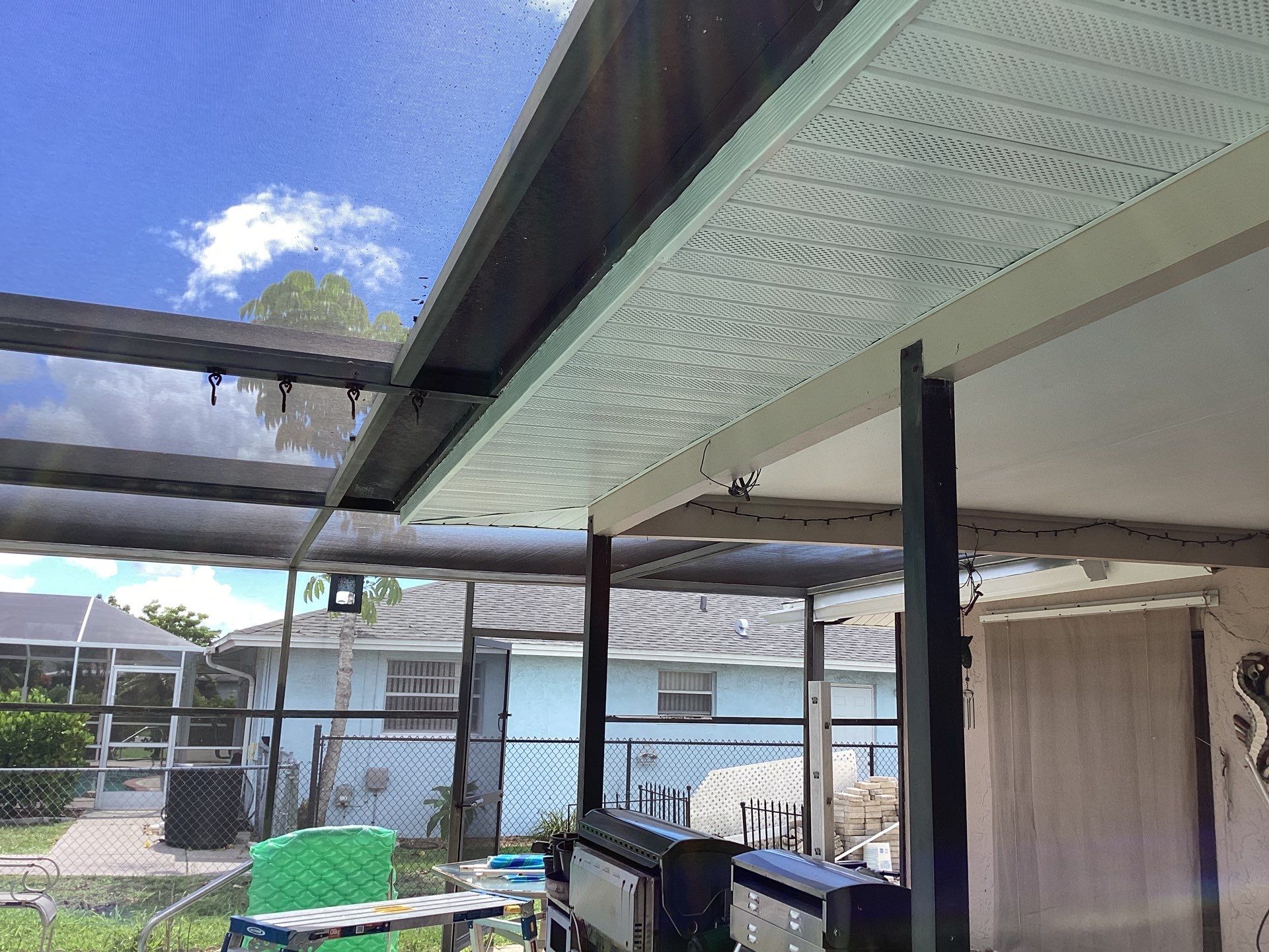 White Seamless Gutters and Splash Guards in Fort Myers FL by Gutter Professor by Gutter Professors