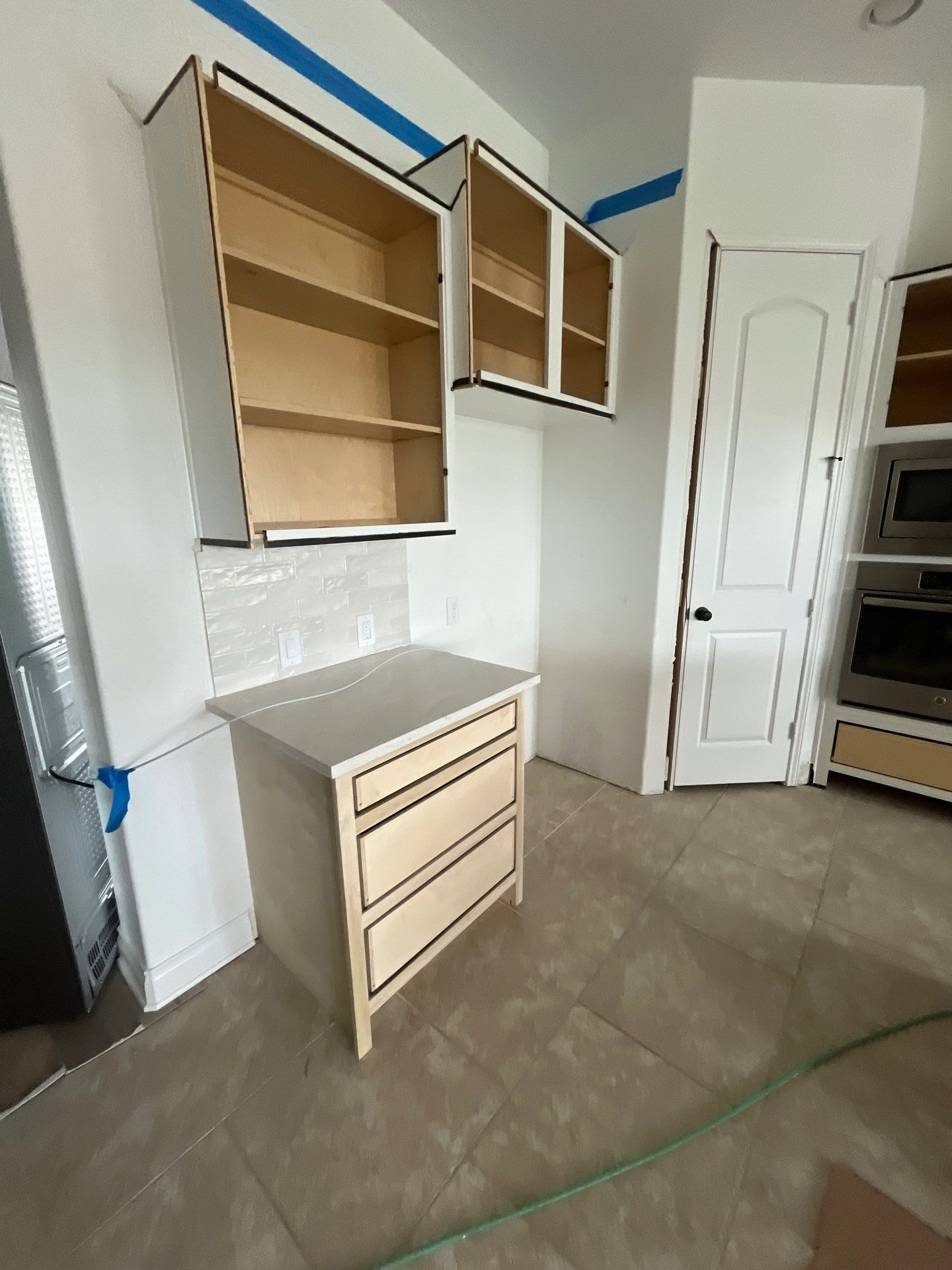 Kitchen Remodel using Water mitigation equipment by L&T General Contractors and Restoration INC