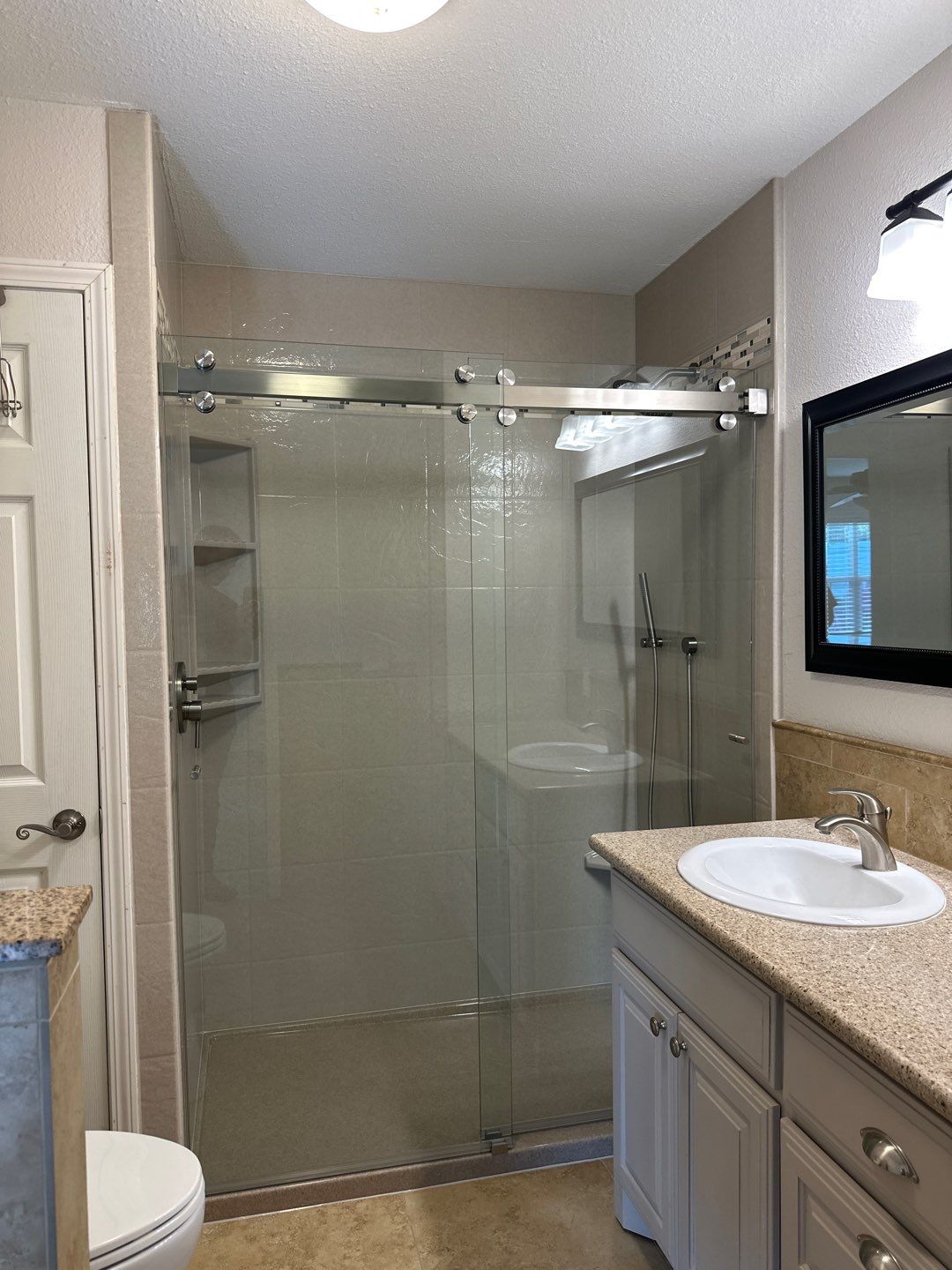 Bathroom Remodel using The Onyx Collection by Ekon Bath, LLC
