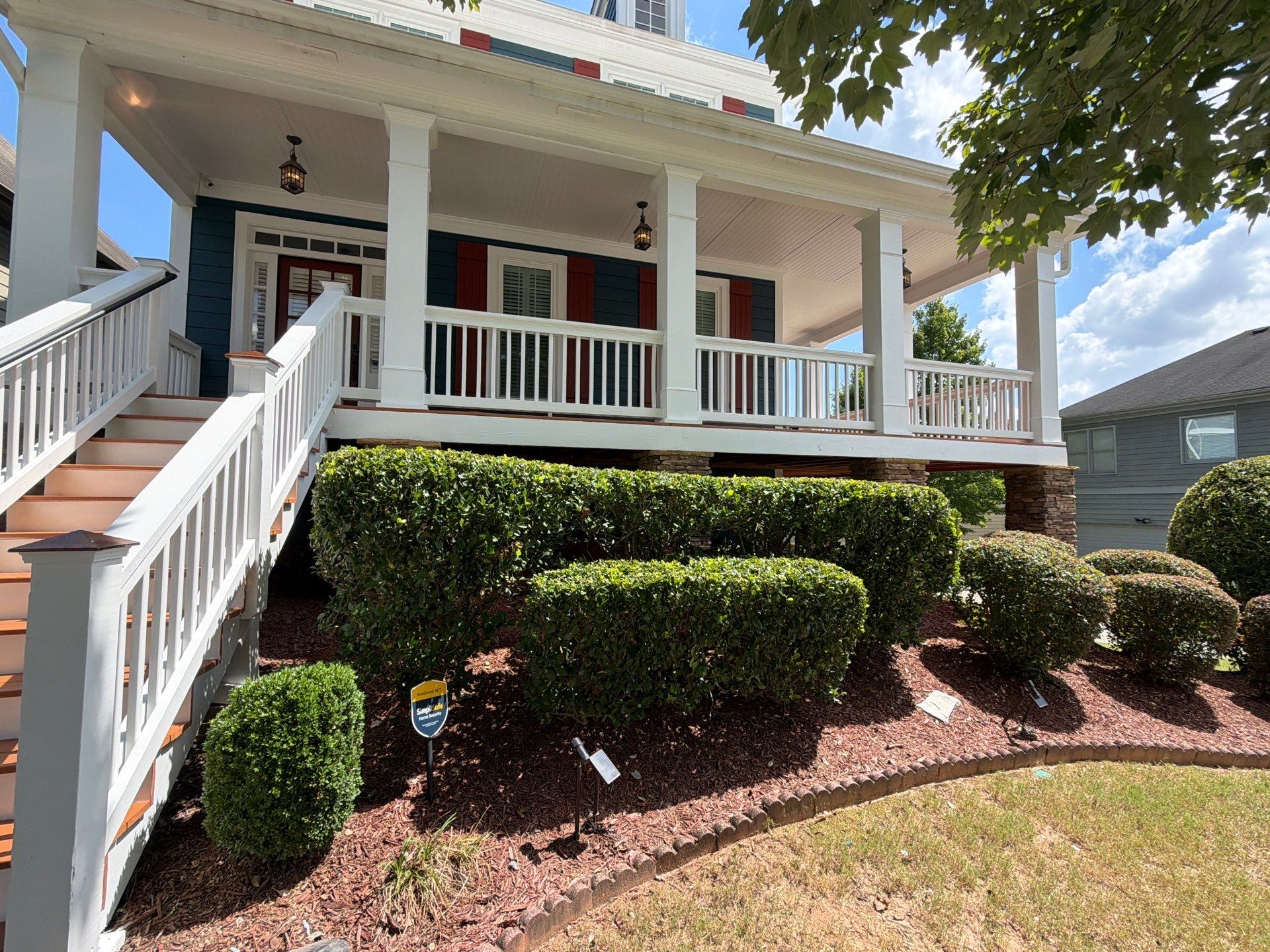 Atlanta Exterior Home Refresh with Blue Siding and Deck Staining by Swift Home Renovations 