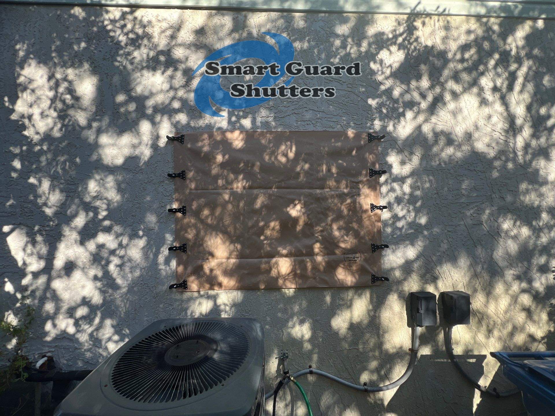 Hurricane Protection in Tan  by Smart Guard Shutters