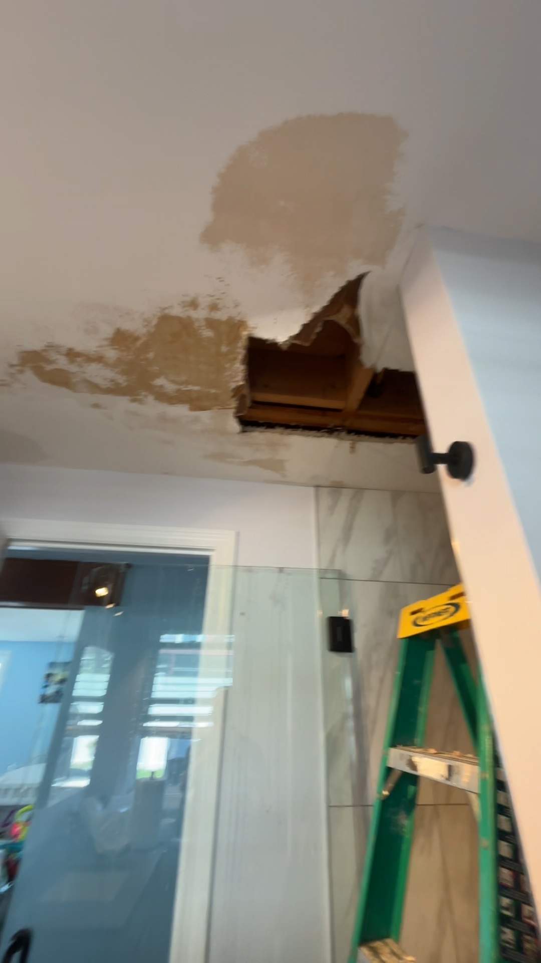Emergency Plumbing Call: Bathroom Ceiling Leak Repair from Tub Drain Failure — Beverly, MA by FAGONE MECHANICAL