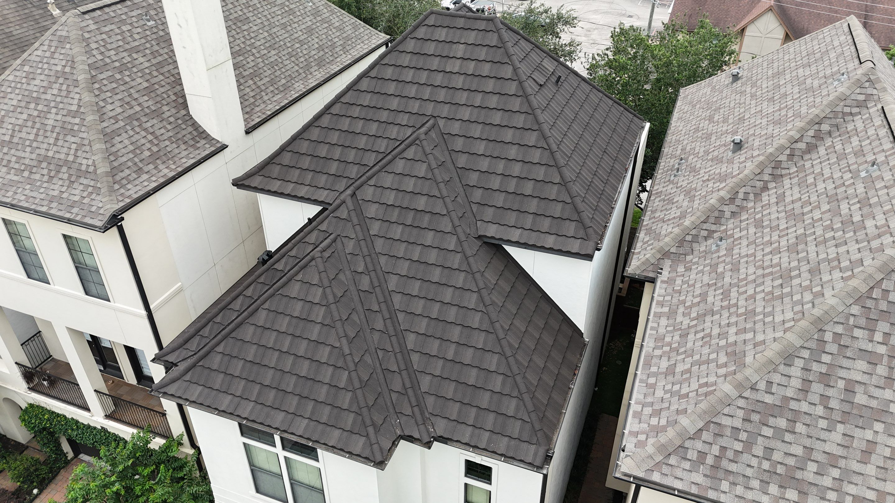 Stunning transformation from Shingles to DECRA Tile by Core Four Roofing