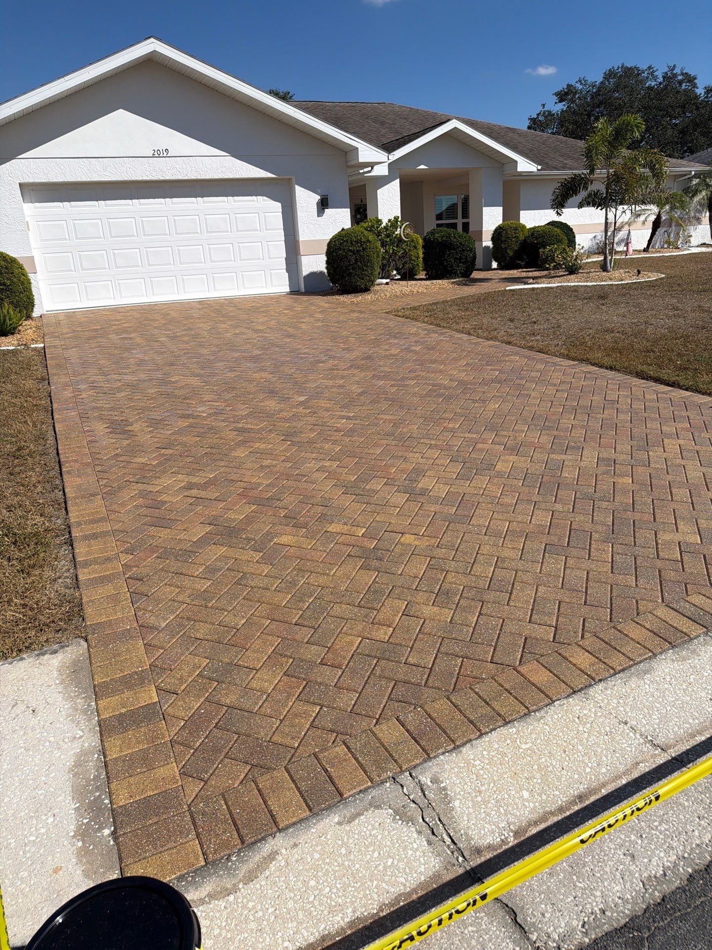 Restoring Herringbone Paver Driveway and Walkway in Sun City Center by Supreme Paver Experts