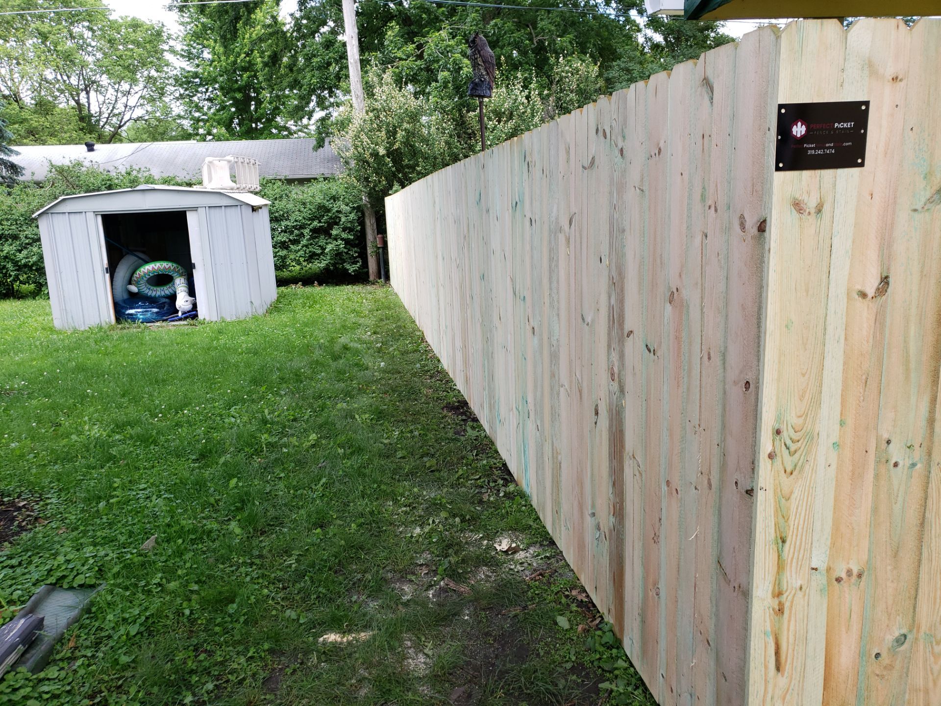 Custom Wood Privacy Fence Installation for Charles City Backyard by Perfect Picket Fence and Stain