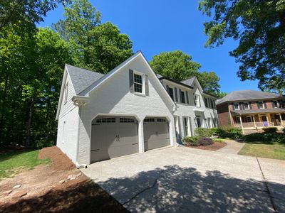 Tree Damage Structural Repair and Exterior Painting in Roswell