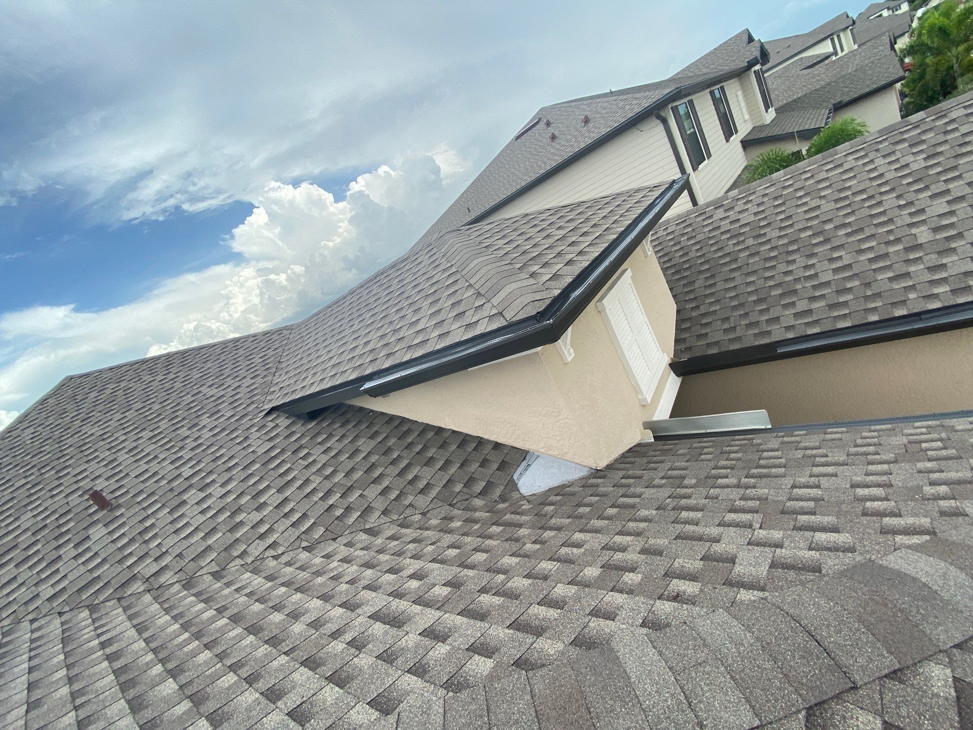 Brown Seamless Gutters for Homes in Fort Myers by Gutter Professors