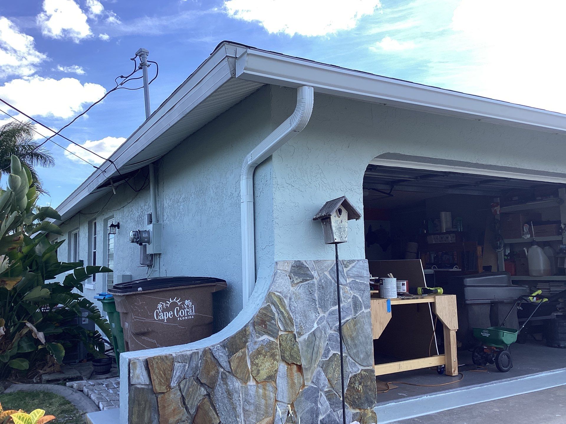 Downspout Installation using 3X4 Elbow Downspout in Cape Coral FL by Gutter Professors