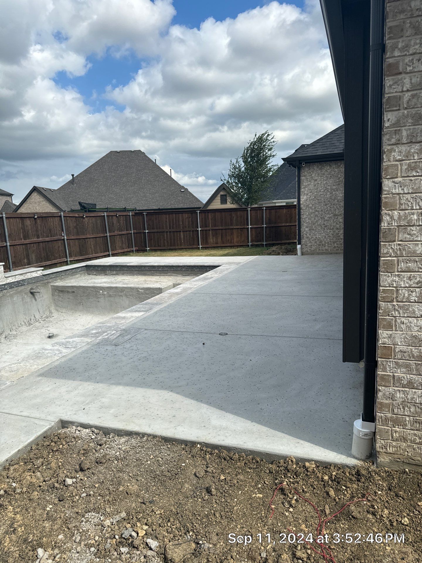 Geometric Pool with Raised Water Feature Wall by Pinnacle Pools and Spas - DFW