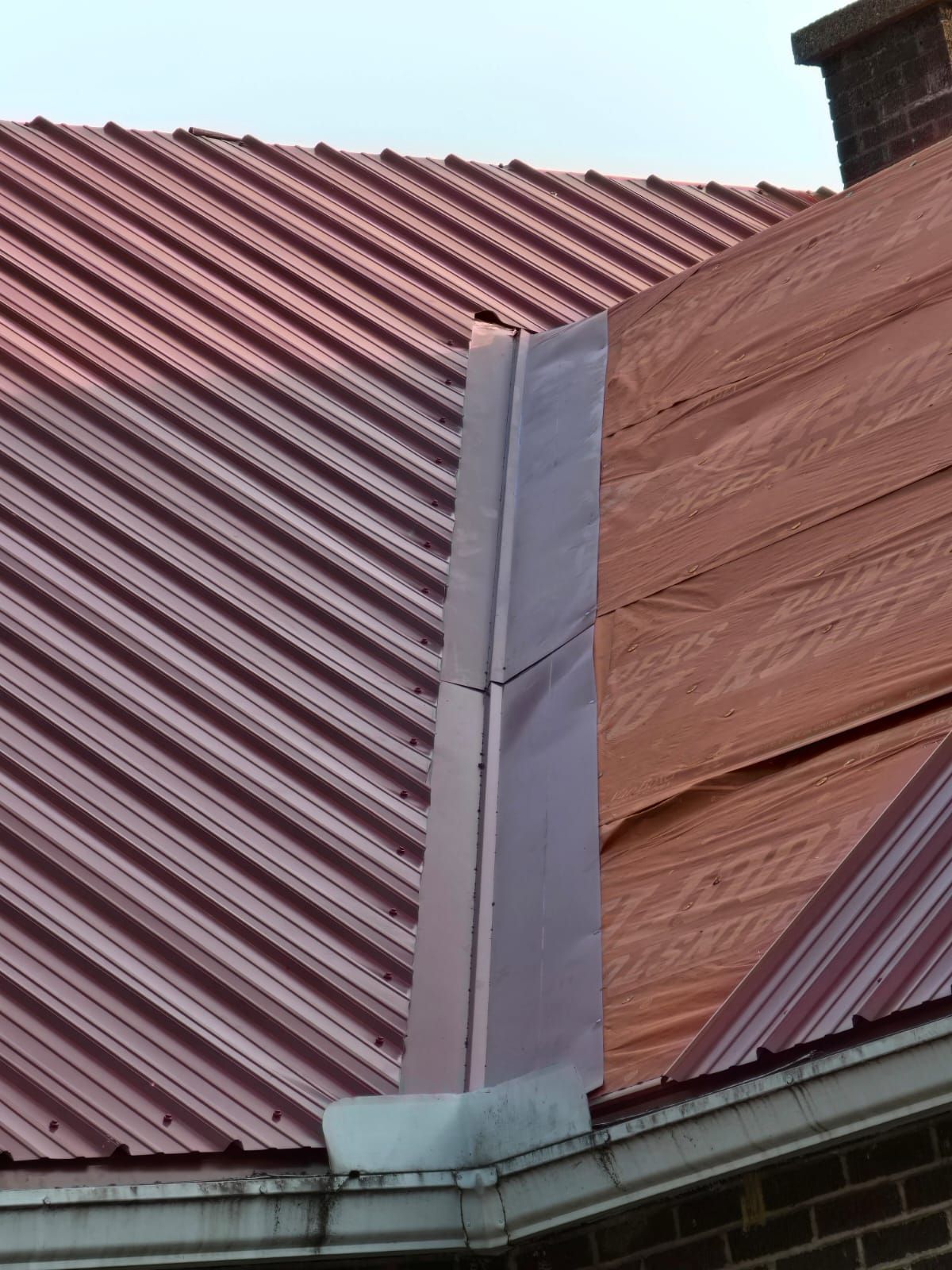 Residential Roofing Installation using Metal by Rainstoppers Roofing