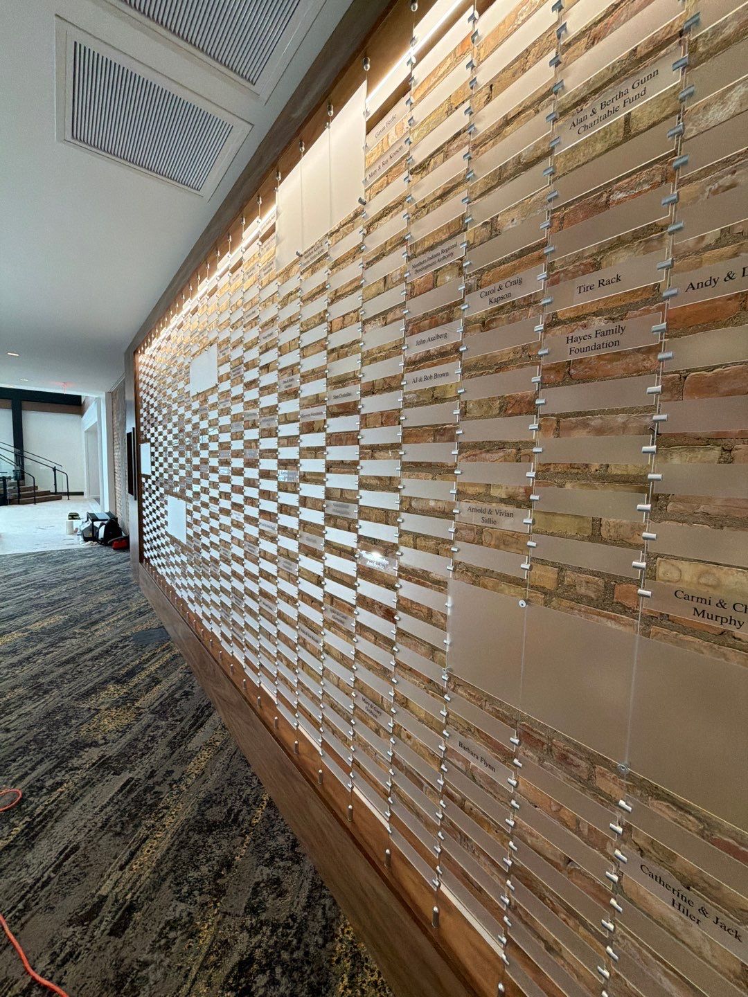 Custom Donor Recognition Walls and Wayfinding for Cultural Arts Center by Hayes Design co