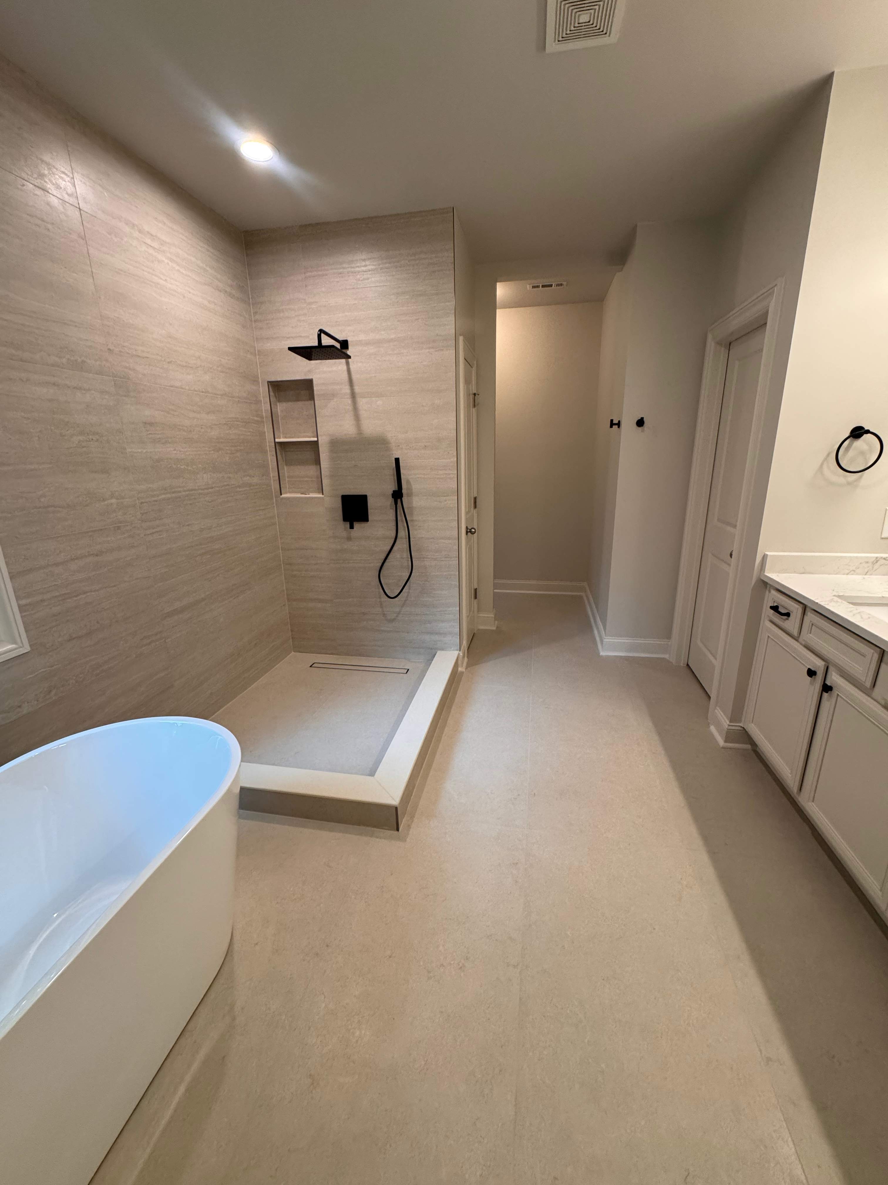 Master bathroom renovation using Free standing tub by Prudencio