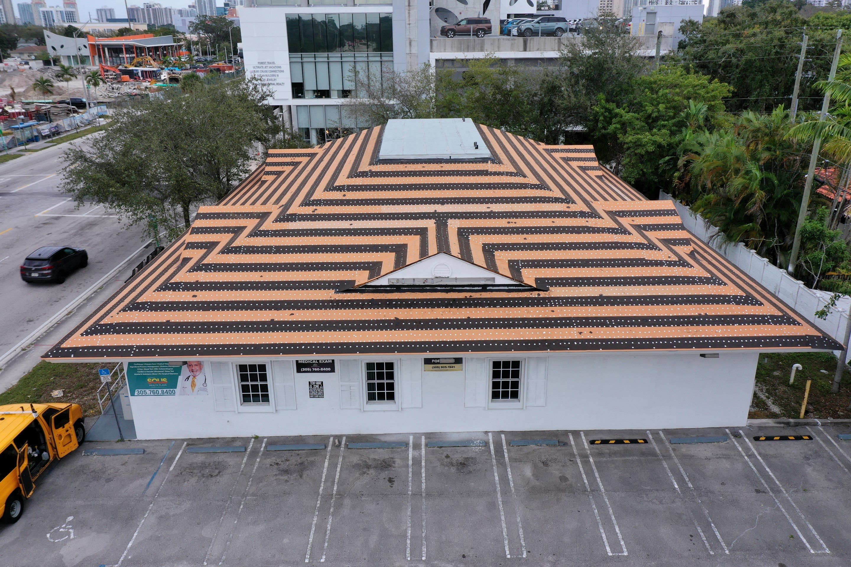 COMMERCIAL REROOF 24 GUAGE MEDIUM BRONZE 1-1/2" MECHANICAL SEAM "ZEBRA METHOD" by Earl W. Johnston Roofing 