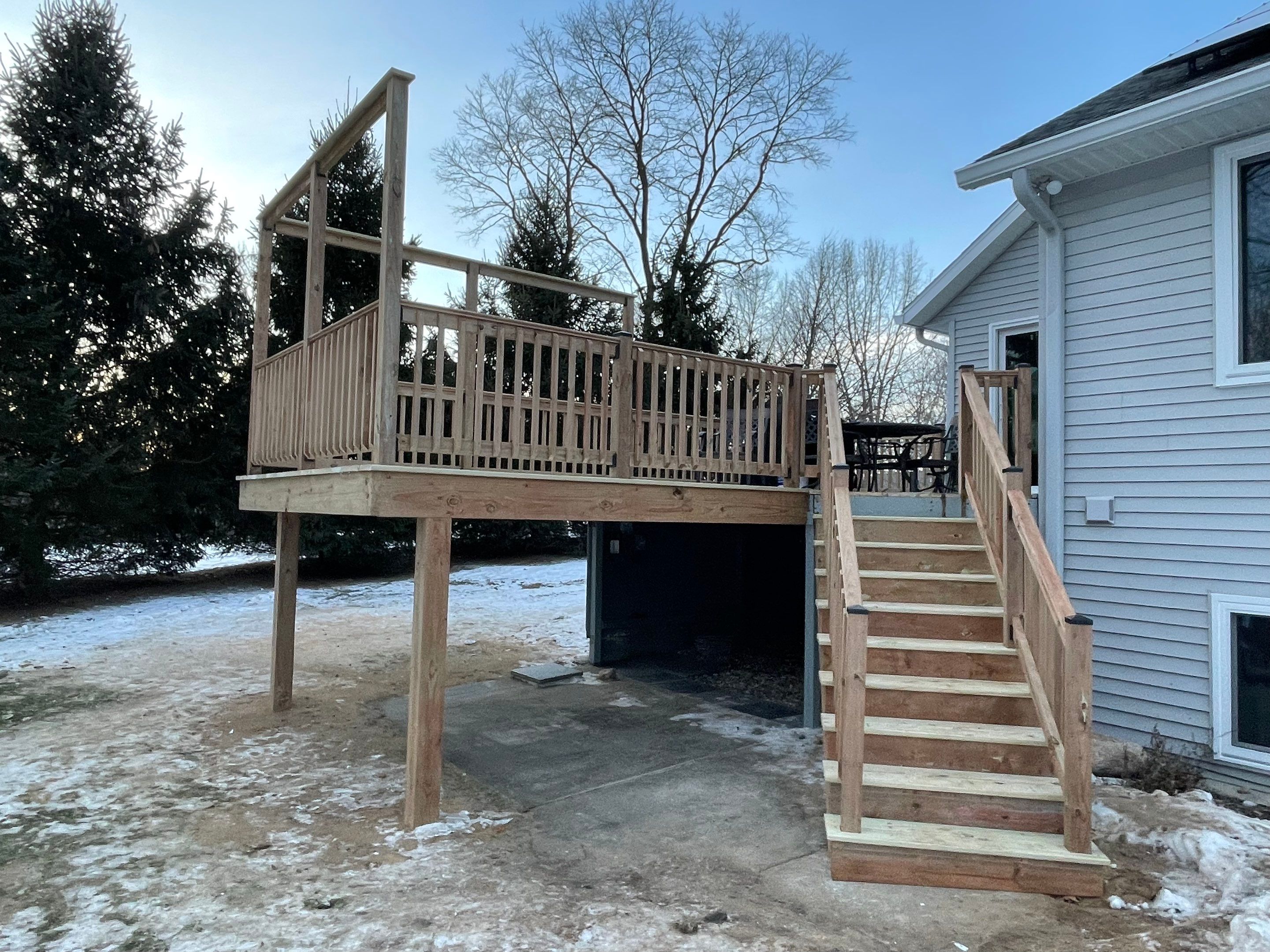 Deck Installation using Treated Lumber by Avalon Roofing and Exteriors