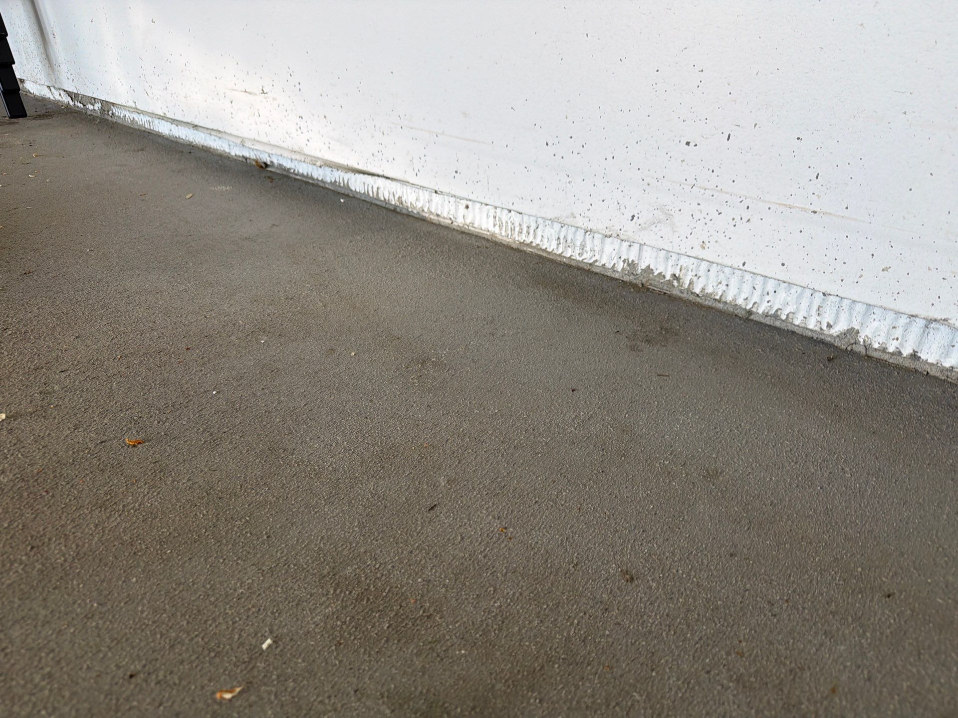 Sioux Falls Garage Floor Coating with Nightfall Decorative Chips by Select Painting, Coatings & Garage Cabinets