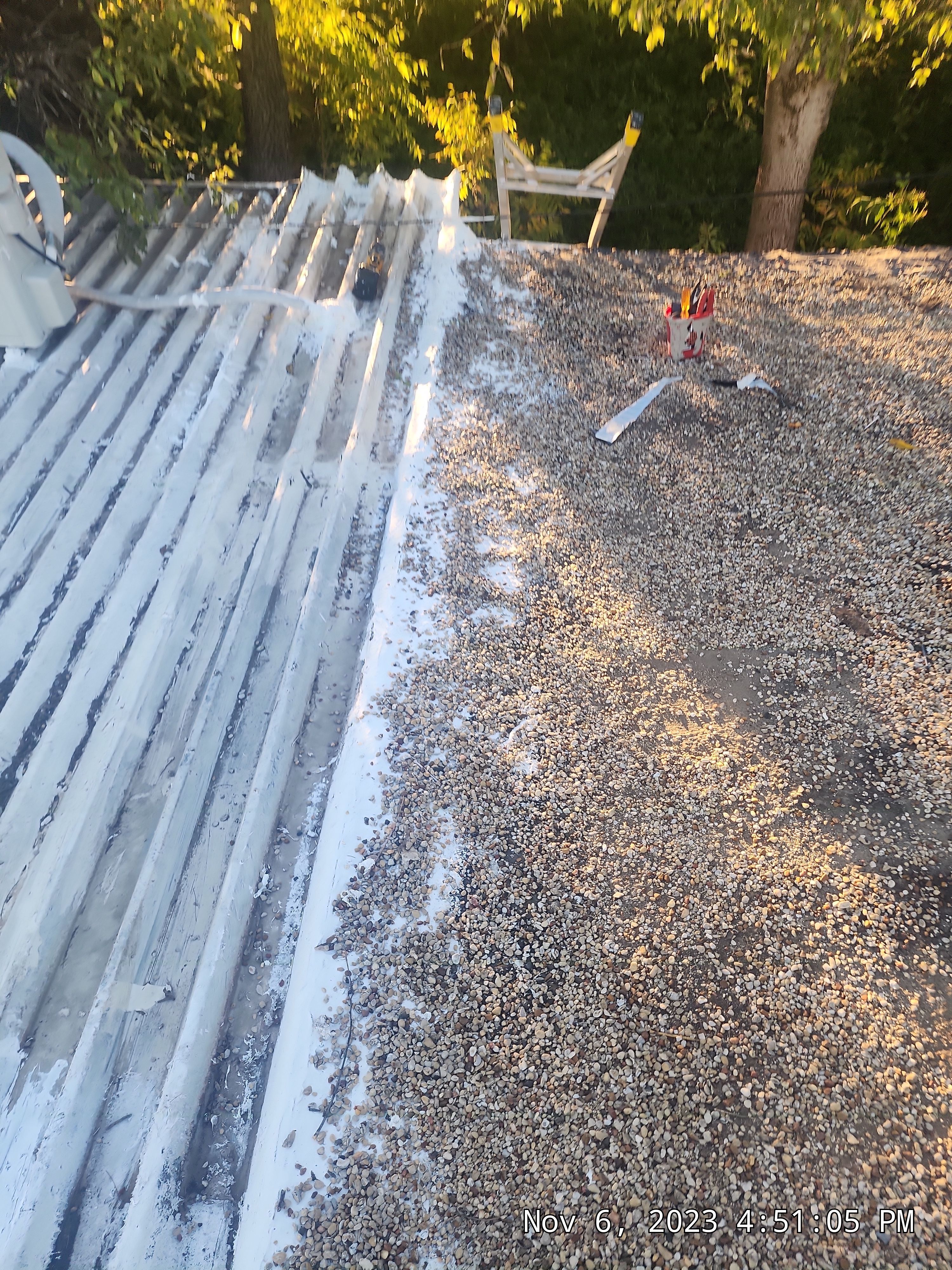 Commercial roofing overlay using GAF TPO over an old ballast roof by Becker Roofing and Exteriors