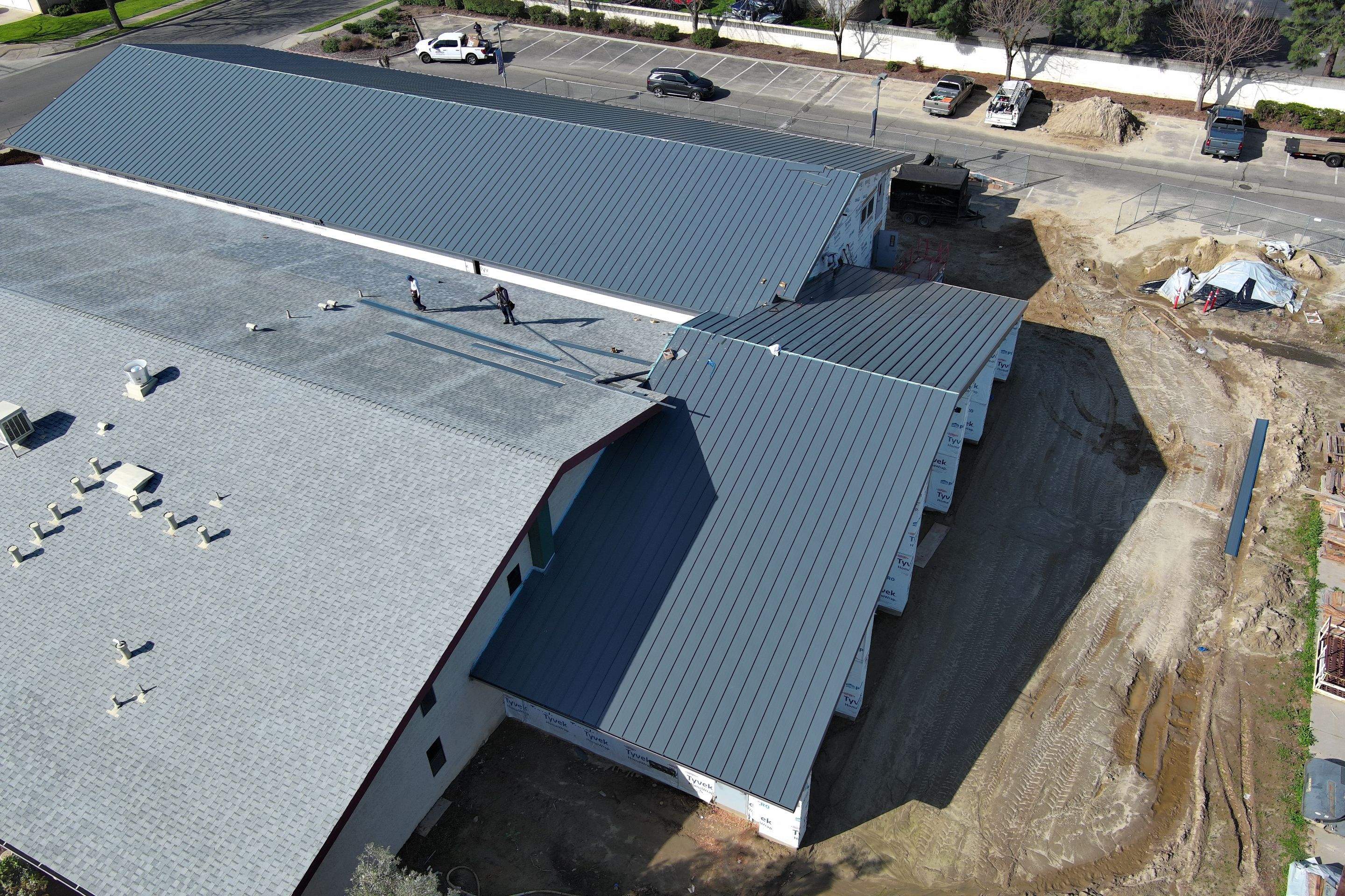 Metal roofing installation on church by Straight Edge Roofing Inc