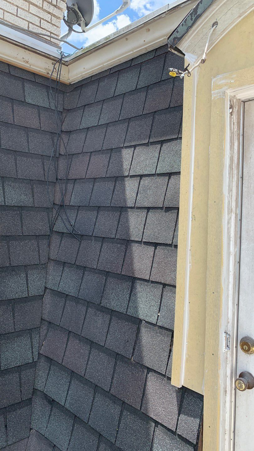 Mansard Charm by Bayfront Roofing and Construction