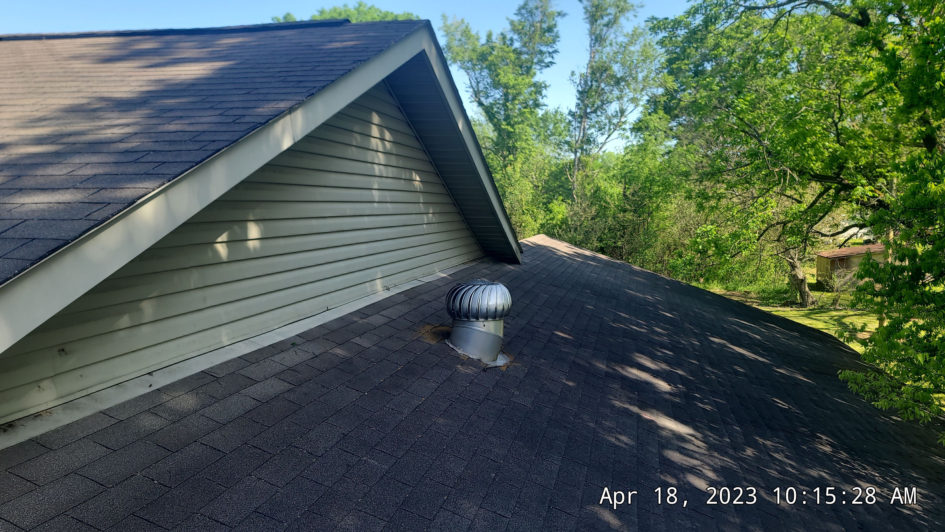 Storm Restoration Reroof: 25 Year 3-Tab Shingle by Hostetler Roofing