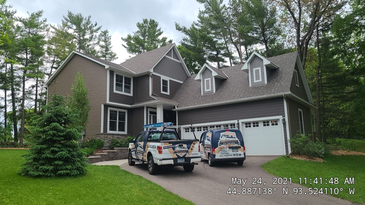 Chanhassen, MN – Roof Replacement with Gutter Guard Upgrade by First Impressions Exteriors