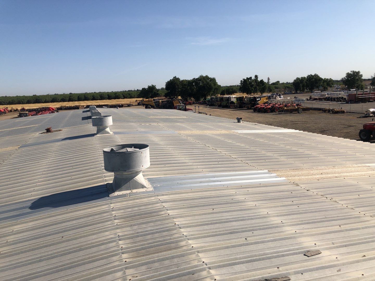Spray foam and coatings using Conklin Benchmark/PUMA XL coatings and spray foam by Straight Edge Roofing Inc
