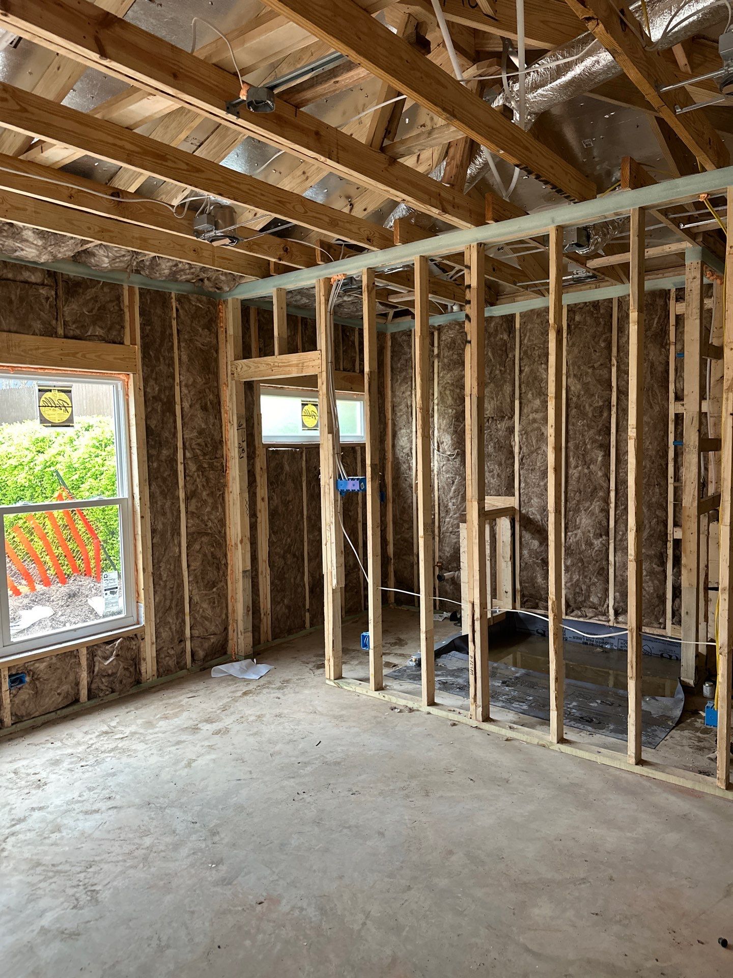 Batt install on Dallas home garage addition with a living suite.  by Apex Insulation Solutions