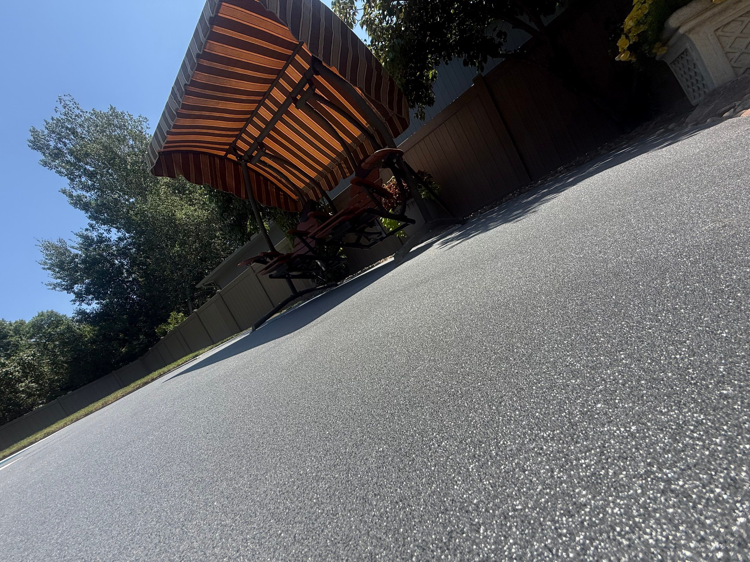 Residential Pool Deck Resurfacing in Sioux Falls by Select Painting, Coatings & Garage Cabinets