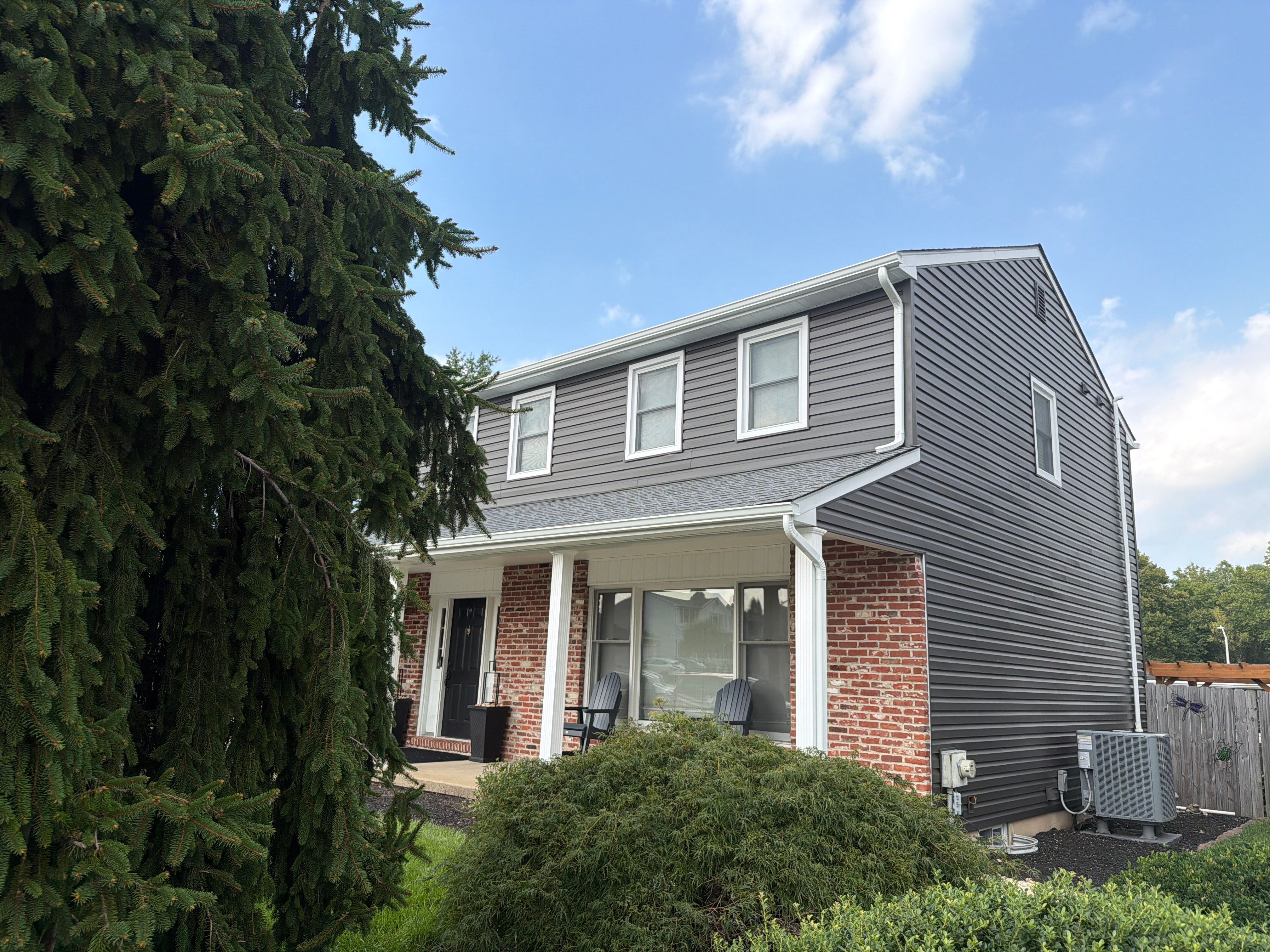 Fairless Hills Exterior Remodel with GAF Roofing and Charcoal Vinyl Siding by Stofan Construction LLC
